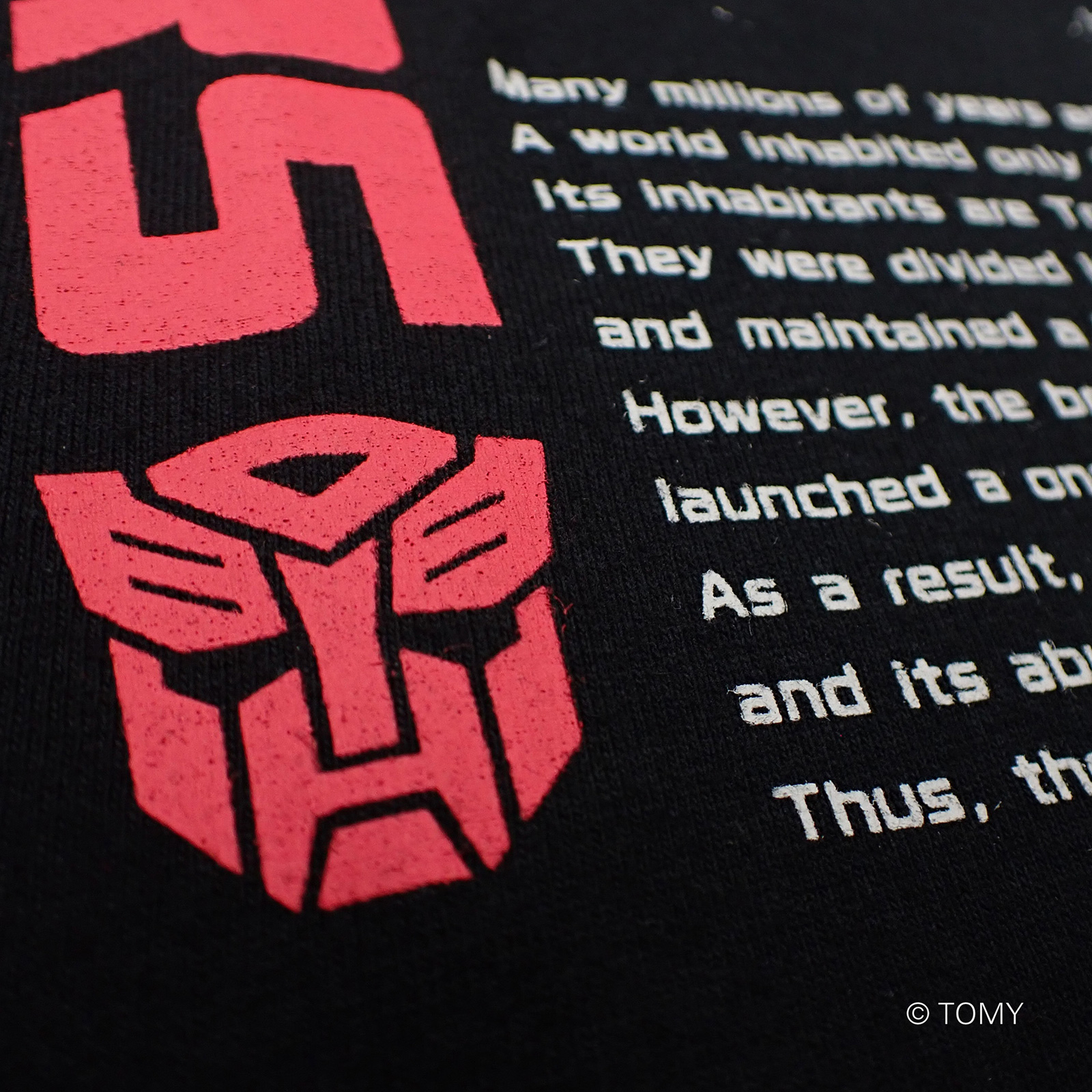 トランスフォーマーライセンスTシャツ03 VSアート：メトロフレックスVSダイナザウラー